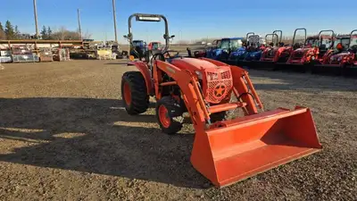 Used 2021 Kubota L3301 33 hp FWA, with LA 525 Loader. 380 hrs. Rear tires filled, 3rd function hydra...