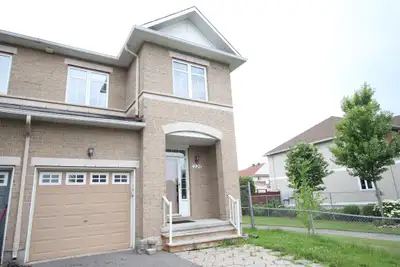 Address is 229 Portrush Ave, Kanata, ON, K2J 5J6. This attractive 3 bedroom/2.5-bathroom townhouse i...