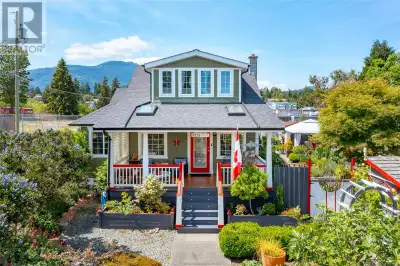 This charming 1940s Arts & Crafts Home nestled in the Heart of Old Chemainus this beautifully mainta...