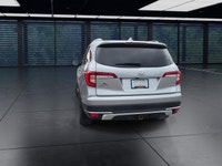 The 2021 Honda Pilot Touring 8-Passenger AWD in Silver is an exceptional choice for those seeking a... (image 6)