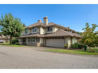 Welcome to this spacious, 3 bed + 3 bath end-unit in the coveted Oak Tree complex that feels like a...