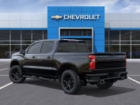 The 2026 Chevrolet Silverado 1500 RST, in its striking black exterior and matching black interior, i... (image 2)
