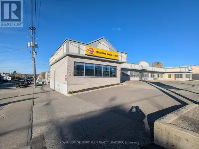 Commercial space available for lease with great exposure! Currently used by Money Mart. Plenty of pa...