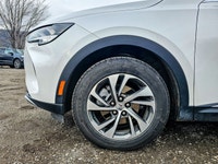 Experience unparalleled style and capability with the 2023 White Buick Envision Essence. This all-wh... (image 4)