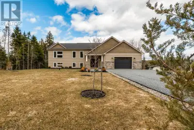Welcome to this stunning custom split-entry bungalow, expertly crafted by ReDesigns Construction. Sh...