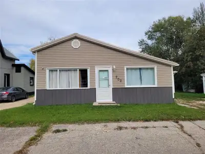 P07//Portage La Prairie/This 5 bedroom, updated 4-piece bathroom is just over 1100 SF. As you enter...
