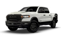 WAS: $91320 NOW: $83070 plus taxes and licensing feesThe 2026 Ram 1500 Rebel 4x4 Crew Cab 5'7" Box i... (image 4)