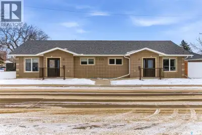 Truly one of a kind, this custom-built, all-brick, bungalow-style duplex offers 2,460 sq. ft. total...