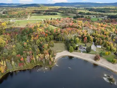 Nestled in the serene embrace of Chichester, Quebec, this 1.5-acre waterfront parcel on the Ottawa R...