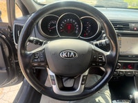 A practical subcompact car with efficient performance, easy maneuverability, and everyday convenienc... (image 9)