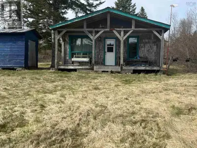 Welcome to 510 Green Settlement Road, nestled on the serene shores of Sandy Gunns Lake, this off-gri...