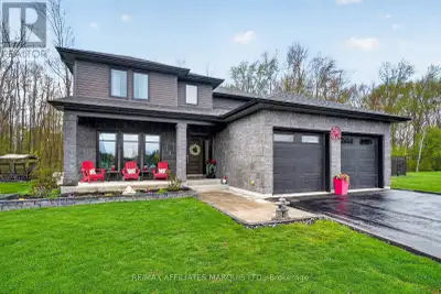 Just a few minutes from Cornwall, this prestigious Menard-built 4+1 bedroom residence offers timeles...