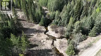 County estate acreage on Bench Creek. 8.08 acres of gently sloping maturely treed land adjacent to p...