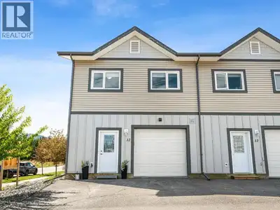 Thoughtfully designed two-storey end unit condo with additional windows offering more natural light...