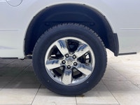 Get ready to own the roads with the stunning 2023 Ram 1500 Classic SLT 4x4 Crew Cab in a pristine wh... (image 5)