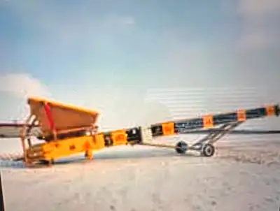42" Belt 60' conveyor . with Grizzly . AR Lined Hopper . Baldor 20 HP electric motor. Dodge TA 4 red...