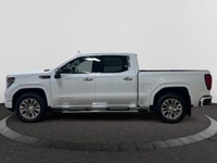 Welcome to Capital GMC! This 2026 GMC Sierra 1500 in Glacier White Tricoat is equipped with 4WD and... (image 1)