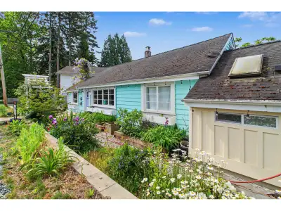 Cute cottage, 2 bedroom and den, updated kitchen, wood flooring, 2 baths, gas fireplace (not working...