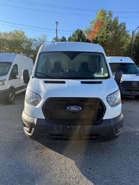 Ready for work. This mid roof transit has power options, divider, bluetooth, a/c, back up camera and... (image 2)