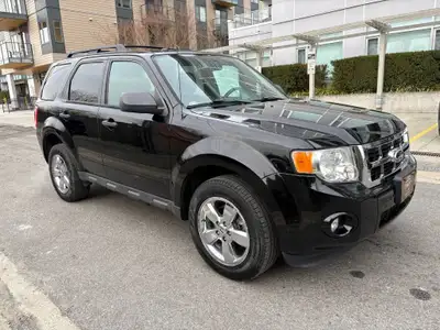 This 2012 Ford Escape in sleek Black is a reliable and practical compact SUV, offering solid perform...