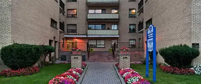 Building Information Blending uptown with downtown. A cute, well-kept mid-rise building, Suncrest Co...