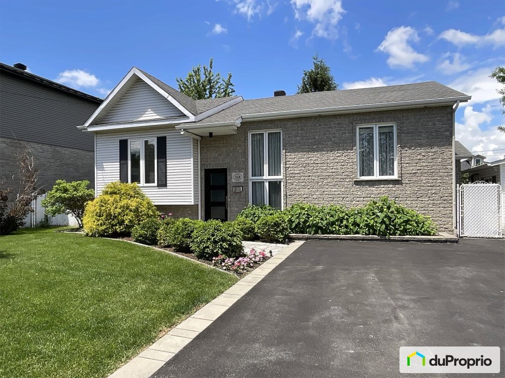$720,000 - Bungalow for sale in Longueuil (St-Hubert) — photo 1