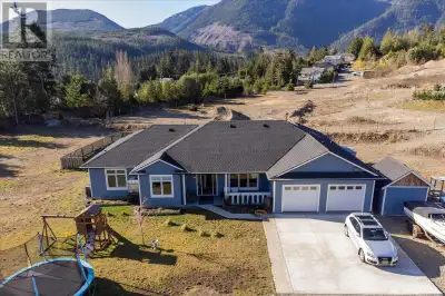 Remarkable Custom Rancher on a flat 2 acre parcel with plenty of sunny exposure in Little Qualicum R...