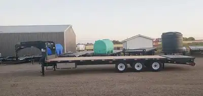 25' deck + 5' beavertail center pop up ramps w/ overcenter camlocks 3 - 7000 lb spring axles Underde...