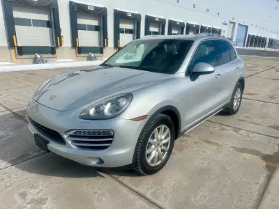 Classic silver metallic on black leather seats. One owner, dealer serviced Western Canada salt free...