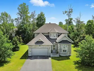 Stunning million-dollar home in prime location ! Located on a large, sought-after lot near the Champ...