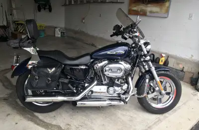 I’m selling as I don’t ride much due to back and shoulder problems. Canadian Motorbike Premium Blue...