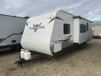 Check out our used 2013 Heartland Trail Runner 28BHK which is a family-focused travel trailer built...