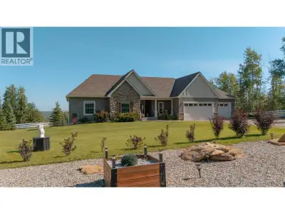 Private 9.3-acre oasis with lake views just 10 minutes from the city. This beautifully built home of...