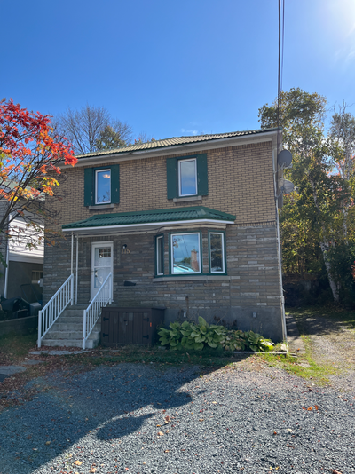 Main Floor, 2 bedroom, 1 bath, fridge stove, coin laundry, parking. walk out to back deck, shared ya...