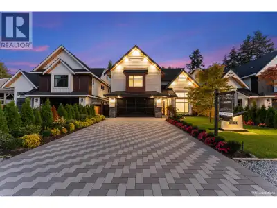 Welcome to this exceptional custom home in Beach Grove. This 5-bed, 5-bath residence includes a den...