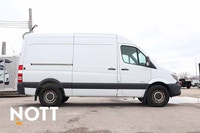 The 2014 Mercedes Sprinter 2500 High Roof is a versatile, heavy-duty cargo van known for its ample i... (image 6)