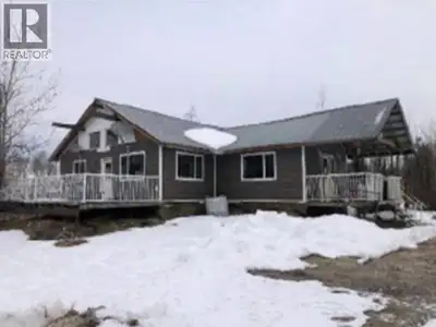 FORECLOSURE, PRICED $240,000 BELOW TAX ASSESSEMENT! Located 7 km south of Mackenzie, BC, 13145 Highw...