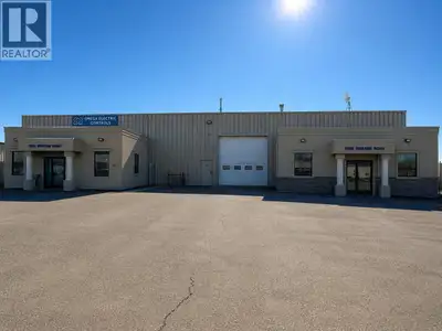 Prime light industrial opportunity in Fort St. John. This 2.49 acre property features a well-maintai...