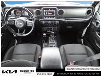The 2022 Jeep Wrangler Unlimited Willys 4x4 in a classic white exterior and rugged 44 drivetrain is... (image 9)