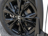 The 2026 Honda CR-V Hybrid Touring AWD in a stunning White finish is revolutionizing the SUV experie... (image 7)