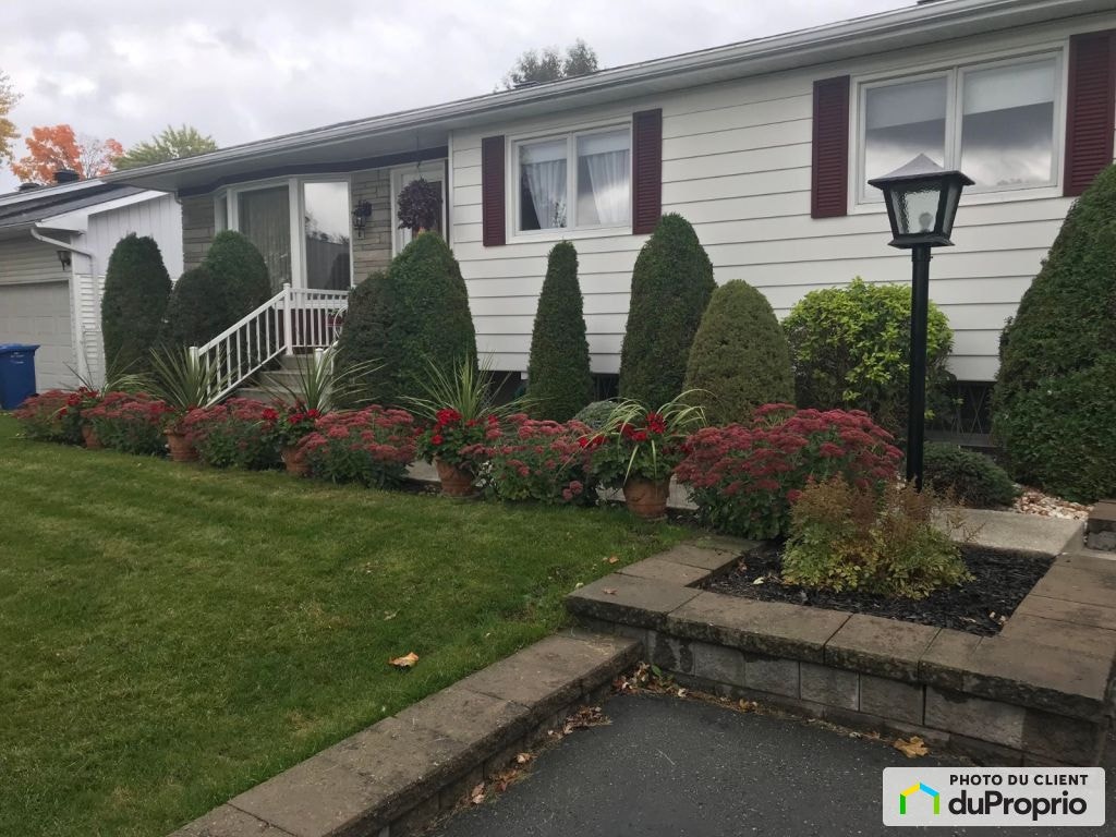 $599,000 - Bungalow for sale in Fabreville — photo 1