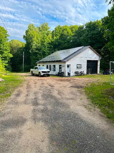 2 year old 2 bedroom garage house 15x25 garage 10x12 door In floor heat Maple kitchen cabinets Quart...
