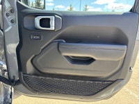This Jeep Wrangler delivers a Gas/Electric V-6 3.6 L/220 engine powering this Automatic transmission... (image 8)