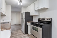 Amenities: In-suite Laundry • Private Yard • Spacious Rooms Suite & Building: Spacious two-bedroom,... (image 6)