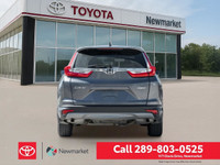 Experience the versatility and comfort of the 2018 Honda CR-V LX AWD in a sophisticated gray finish,... (image 5)