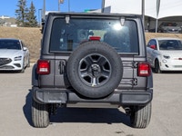 This Jeep Wrangler has a strong Regular Unleaded V-6 3.6 L/220 engine powering this Automatic transm... (image 6)