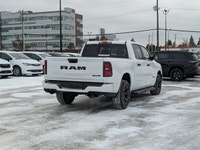 The 2026 Ram 1500 Black Express delivers bold styling and confident capability in a full size pickup... (image 6)