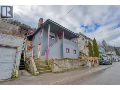 Cute, cozy, and full of character! This charming river-view home sits on a large lot and has been th...