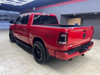 Introducing the 2022 Ram 1500 Sport, draped in a stunning red finish and powered by a robust 4x4 dri... (image 6)