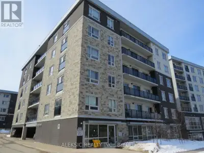 Stylish, Sun-Filled Condo in the Heart of the University District. Welcome to modern urban living! T...